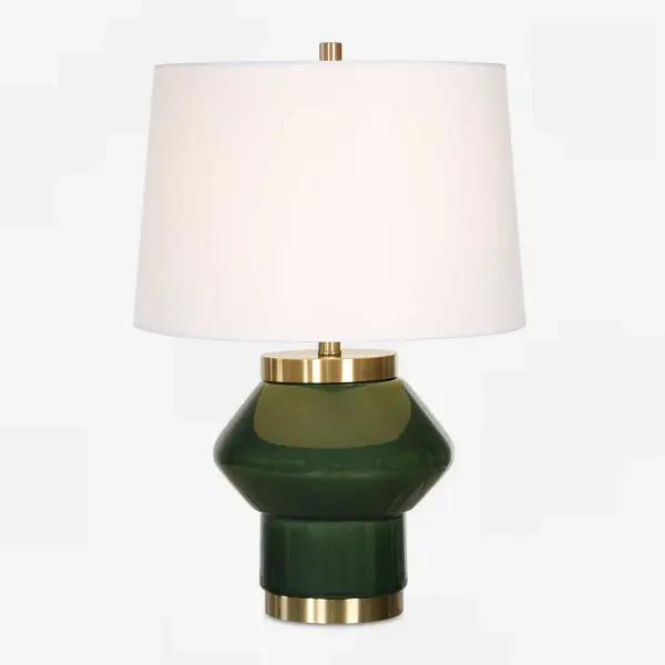 The Tayson Table Lamp Showcases A Jade Green Ceramic Base Accented With Antique Brass Plated Details, Blending Striking Design With Contemporary Elegance. The Tapered Hardback Shade Is Covered In A Crisp White Linen Fabric. Collection: Tayson Designer: David Frisch Finish: Antique Brass Glass: Round Hardback Shade Width: 17.00" Height: 32.00" Length: 17.00" Weight: 9.00 lb Number of Bulbs: 1 Maximum Wattage: 150.00 W Bulb Type: A Voltage: 110.00 V Material: Ceramic, Metal, Fabric Country of Origin: Cambodia Safety Rating: Indoor Only