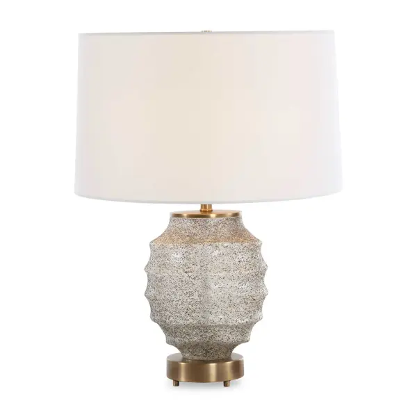 The Acosta Table Lamp Offers A Unique And Stylish Lighting Option Crafted From Textured Glass. Its Ribbed Glass Base In Tones Of Dark Bronze, Rust Brown And Frosted White Offers A Rustic Yet Modern Appeal And Is Accented With Antiqued Brass Plated Details. The Slightly Tapered Round Hardback Shade Is Covered In A White Linen Fabric. Collection: Acosta Designer: David Frisch Finish: Antiqued Brass Glass: Round Hardback Shade Width: 17.00" Height: 22.25" Length: 17.00" Weight: 7.30 lb Number of Bulbs: 1 Maximum Wattage: 100.00 W Bulb Type: A Voltage: 110.00 V Material: Metal & Glass & Linen Country of Origin: China Safety Rating: Indoor Only