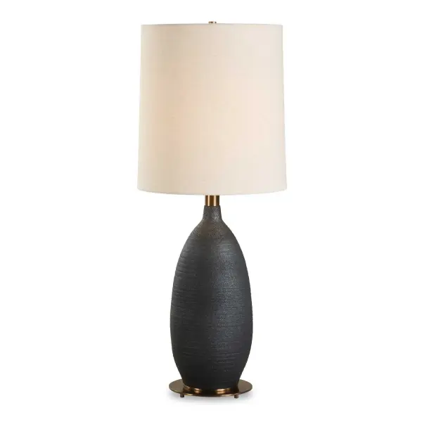 The Bower Table Lamp Features A Textured Ceramic Base Finished In A Modern Matte Black Glaze Paired With Antique Brass Plated Details. The Tall, Slightly Tapered, Round Hardback Shade Covered In A Casual White Fabric With Natural Slubbing Completes This Piece. Collection: Bower Designer: David Frisch Finish: Antique Brass Plated Glass: Round Hardback Shade Width: 14.00" Height: 34.50" Length: 14.00" Weight: 10.50 lb Number of Bulbs: 1 Maximum Wattage: 150.00 W Bulb Type: A Voltage: 110.00 V Material: Steel & Ceramic & Linen Country of Origin: China Safety Rating: Indoor Only