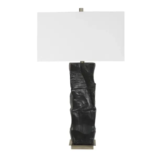 This Eye-catching Ceramic Table Lamp Is A Perfect Blend Of Artistry And Function. It Features A Uniquely Textured Base Finished In Satin Black, Accented With Brass Plated Detailing. The Rectangle Shade Is Covered In A Crisp White Linen Fabric. Collection: Altaria Designer: David Frisch Finish: Brass Width: 20.00" Height: 33.00" Length: 11.00" Weight: 12.00 lb Number of Bulbs: 1 Maximum Wattage: 150.00 W Bulb Type: A Voltage: 110.00 V Material: Metal, Ceramic,fabric Country of Origin: Cambodia Safety Rating: Indoor Only