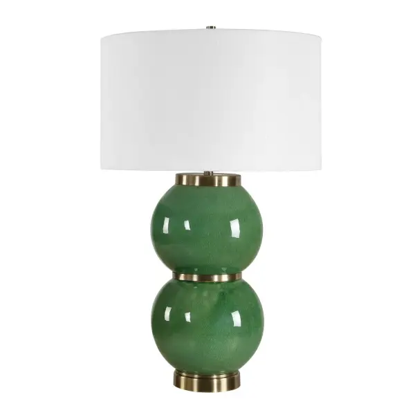 The Banner Table Lamp Showcases Two Large, Stacked Spheres Finished In A Moss Green Glaze, Accented With Antique Brass Plated Details. The Round Hardback Drum Shade Is A White Linen Fabric. Collection: Banner Designer: Renee Wightman Finish: Antique Brass Width: 17.00" Height: 28.00" Length: 17.00" Weight: 12.00 lb Number of Bulbs: 1 Maximum Wattage: 150.00 W Bulb Type: A Voltage: 110.00 V Material: Metal,Ceramic,Fabric Country of Origin: Cambodia Safety Rating: Indoor Only