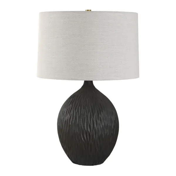 The Levee Table Lamp Features A Simple Shaped Ceramic Base That Is Enhanced With A Repeating Chiseled Pattern, Finished In A Textured Satin Black Glaze. The Slightly Tapered Hardback Shade Is Covered In A Light Gray Linen Fabric. Collection: Levee Designer: Carolyn Kinder Finish: Textured Satin Black Width: 18.00" Height: 27.00" Length: 18.00" Weight: 10.10 lb Number of Bulbs: 1 Maximum Wattage: 150.00 W Bulb Type: A Voltage: 110.00 V Material: Iron & Ceramic Country of Origin: China Safety Rating: Indoor Only