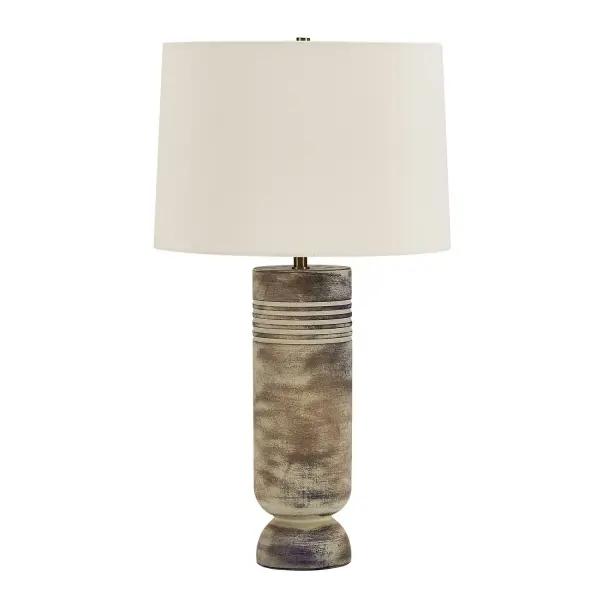 The Vale Table Lamp Boasts A Unique Ceramic Base With Horizontal Grooves, Finished In A Subtle Gray Wash With Warm Beige And Earthy Brown Hues, All Accented With Antique Brass Plated Details. The Slightly Tapered Round Shade Is Covered In A Warm White Linen Fabric. Collection: Vale Designer: Osvaldo Mendoza Finish: Antique Brass Width: 16.00" Height: 28.38" Length: 16.00" Weight: 8.00 lb Number of Bulbs: 1 Maximum Wattage: 150.00 W Bulb Type: A Voltage: 110.00 V Material: CERAMIC,FABRIC, GALVANIZED STEEL Country of Origin: Vietnam Safety Rating: Indoor Only