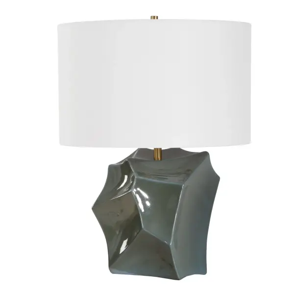 The Prisma Table Lamp Features A Faceted Ceramic Base Covered In A Metallic Smoky Bronze Glaze With Dark Teal Undertones, Complemented By Antique Brass Plated Accents. The Round Hardback Drum Shade Is A Crisp White Linen Fabric. Due To The Nature Of Fired Glazes On Ceramic Finishes Will Vary Slightly. Collection: Prisma Designer: Matthew Williams Finish: Antique Brass Width: 18.00" Height: 24.00" Length: 18.00" Weight: 8.80 lb Number of Bulbs: 1 Maximum Wattage: 150.00 W Bulb Type: A Voltage: 110.00 V Material: Ceramic ,Iron , Shade Country of Origin: China Safety Rating: Indoor Only
