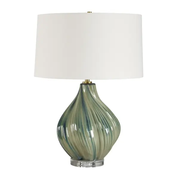 Graced With A Subtly Swirled Ceramic Base, This Elegant Table Lamp Showcases A Harmonious Blend Of Muted Greens And Blue Tones. Its Sophisticated Design Is Further Elevated By A Crystal Foot And Antique Brass Plated Accents. The Slightly Tapered Round Hardback Shade Is Covered In A Crisp White Linen Fabric. Collection: Tausha Designer: Renee Wightman Finish: Antique Brass Width: 18.00" Height: 25.50" Length: 18.00" Weight: 10.20 lb Number of Bulbs: 1 Maximum Wattage: 150.00 W Bulb Type: A Voltage: 110.00 V Material: Iron,Crystal, Ceramic,Fabric Country of Origin: China Safety Rating: Indoor Only