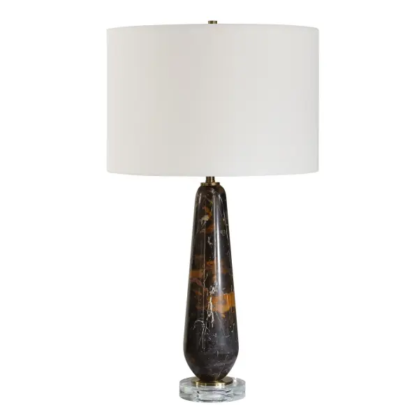 The Dames Table Lamp Showcases A Striking Dark Marble Base With Contrasting White And Chocolate Brown Veining, Complimented With Antique Brass Plated Details And A Thick Crystal Foot. The Round Hardback Drum Shade Is Covered In A Crisp White Linen. True To The Nature Of Natural Materials, Each Piece Will Have Unique Marbling And Veining Throughout. Collection: Dames Designer: David Frisch Finish: Antique Brass Width: 15.00" Height: 26.75" Length: 15.00" Weight: 13.67 lb Number of Bulbs: 1 Maximum Wattage: 150.00 W Bulb Type: A Voltage: 110.00 V Material: Iron &Crystal & Marble Country of Origin: China Safety Rating: Indoor Only