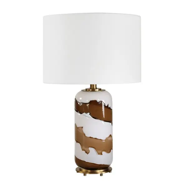 This Chic Art Glass Table Lamp Features A Dynamic Swirl Of White And Brown Tones, Accented With Antique Brass Plated Details. The Round Hardback Drum Shade Is Covered In A Crisp White Linen Fabric. Collection: Ararat Finish: Antique Brass Width: 15.00" Height: 24.00" Length: 15.00" Weight: 8.60 lb Number of Bulbs: 1 Maximum Wattage: 150.00 W Bulb Type: A Voltage: 110.00 V Material: Metal,glass,linen Country of Origin: China Safety Rating: Indoor Only