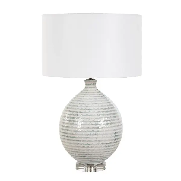 Featuring A Textured, Horizontally Striped Ceramic Base In Soothing White And Gray Tones, The Clary Table Lamp Elegantly Rests On A Clear Crystal Foot, Accented By Antique Brass Plated Details. A Round Hardback Drum Shade Covered In Crisp White Linen Fabric Completes The Look. Due To The Nature Of Fired Glazes On Ceramic Lamps, Finishes Will Vary Slightly. Collection: Clary Designer: Renee Wightman Finish: Antique Brass Width: 17.00" Height: 26.50" Length: 17.00" Weight: 10.56 lb Number of Bulbs: 1 Maximum Wattage: 150.00 W Bulb Type: A Voltage: 110.00 V Material: Ceramic,Crystal,Iron,Fabric Country of Origin: China Safety Rating: Indoor Only