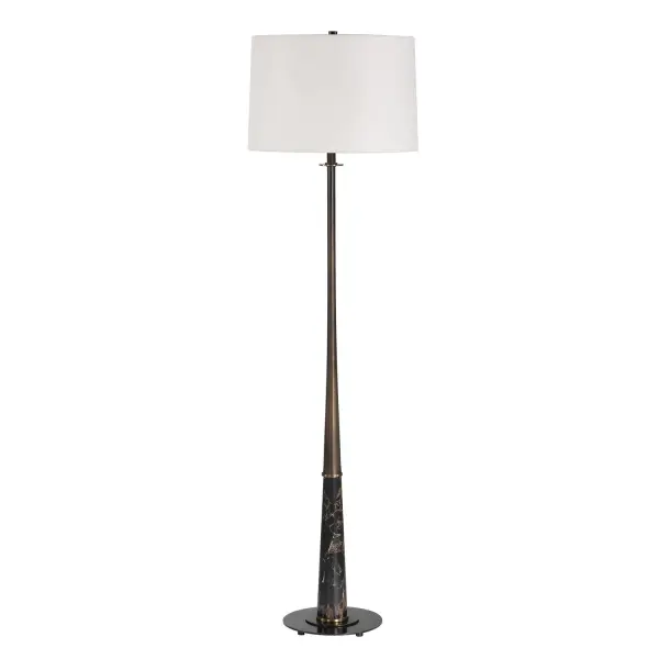 The Striking Tallarico Floor Lamp Features A Dark Bronze Iron Base That Tapers Elegantly, Split By A Section Of Black Marble With White And Chocolate Brown Veining, Accented By Hints Of Antique Brass Details. The Slightly Tapered Round Hardback Shade Is Covered In A Crisp White Linen Fabric. Because Of The Natural Characteristics Of Marble, Each Piece Will Have Unique Veining Patterns. Collection: Tallarico Designer: John Kowalski Finish: Antique Brass Width: 16.00" Height: 61.00" Length: 16.00" Weight: 17.60 lb Number of Bulbs: 1 Maximum Wattage: 150.00 W Bulb Type: A Voltage: 110.00 V Material: Marble+IRON+fabric Country of Origin: China Safety Rating: Indoor Only