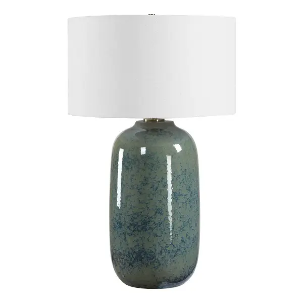 The Caliendo Table Lamp Features A Stunning Blend Of Blue And Sage Tones With A Mottled Texture Spanning The Entire Ceramic Base, Accented With Antique Brass Plated Details. The Round Hardback Drum Shade Is Covered In A Crisp White Linen Fabric. Due To The Nature Of Fired Glazes On Ceramic Lamps, Finishes Will Vary Slightly. Collection: Caliendo Finish: Antique Brass Width: 19.00" Height: 30.50" Length: 19.00" Weight: 10.50 lb Number of Bulbs: 1 Maximum Wattage: 150.00 W Bulb Type: A Voltage: 110.00 V Material: Steel,Ceramic,Fabric Country of Origin: China Safety Rating: Indoor Only