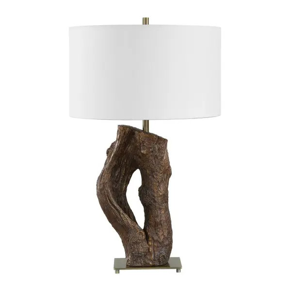 The Namath Table Lamp Showcases A Sculptural Base With A Textured Wooden Motif, Artfully Paired With Antique Brass Accents To Elevate Its Nature-inspired Design. Finished With A Round Hardback Drum Shade Covered In A Crisp White Linen Fabric. Collection: Namath Designer: David Frisch Finish: Antique Brass Width: 17.50" Height: 29.50" Length: 17.50" Weight: 9.68 lb Number of Bulbs: 1 Maximum Wattage: 150.00 W Bulb Type: A Voltage: 110.00 V Material: Iron, Resin,fabric Country of Origin: China Safety Rating: Indoor Only