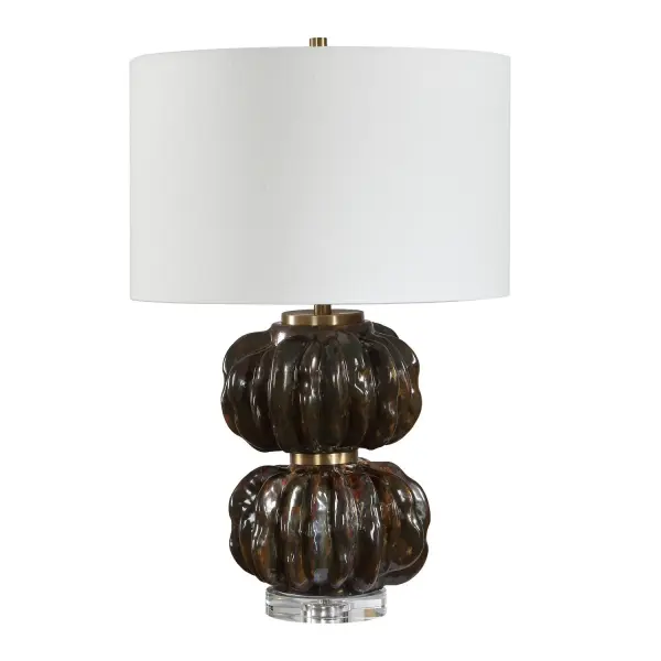 Deeply Ridged And Organically Shaped, This Stacked Ceramic Base Features A Lustrous Variegated Glaze In Shades Of Dark Bronze And Chocolate With Light Undertones. A Clear Crystal Foot And Brass Accents Add A Refined Touch To The Design. The Round Hardback Drum Shade Is Covered In A Crisp White Linen Fabric. Due To The Nature Of Fired Glazes On Ceramic Lamps, Finishes Will Vary Slightly. Collection: Jaudon Designer: Renee Wightman Finish: Dark Bronze Width: 16.00" Height: 24.50" Length: 16.00" Weight: 10.58 lb Number of Bulbs: 1 Maximum Wattage: 150.00 W Bulb Type: A Voltage: 110.00 V Material: Ceramic,Crystal, Iron,Fabric Country of Origin: China Safety Rating: Indoor Only