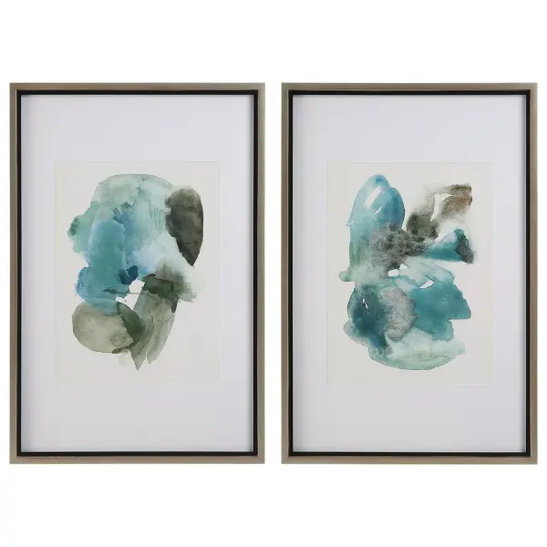 An abstract watercolor duo in smoke gray and turquoise blue, matted in white and framed in champagne gold for a refined, gallery-style look.