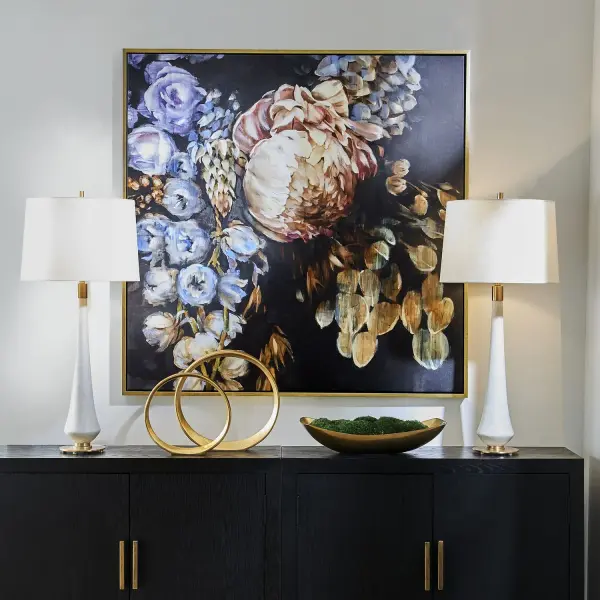 A striking large-scale floral giclee on canvas with dramatic black background, framed in a solid wood gallery frame with gold finish. Handcrafted in the USA.