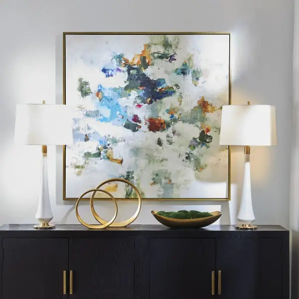 A large-scale abstract giclee canvas in a solid wood gold gallery frame. Versatile hanging orientation and USA craftsmanship make it a striking statement piece.