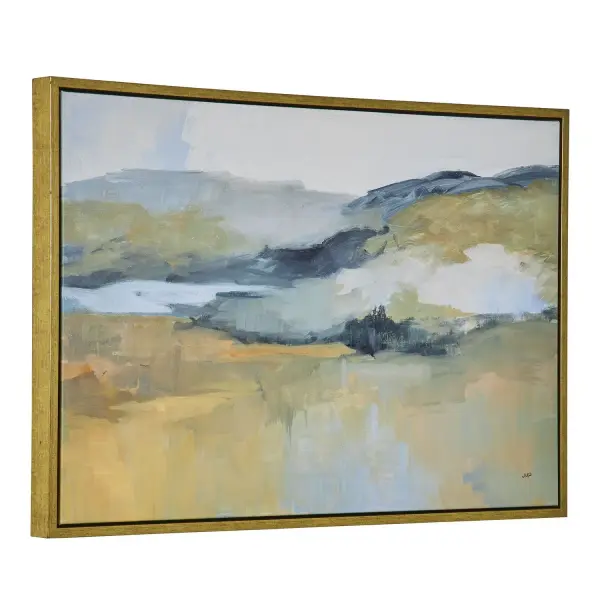 A USA-made abstract landscape canvas in sky blue and honey yellow tones, framed in a solid wood gold gallery frame for understated coastal-contemporary style.