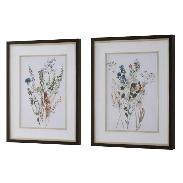 A charming pair of pressed-flower inspired watercolor prints with white linen mats and dark walnut frames, bringing traditional warmth to walls.