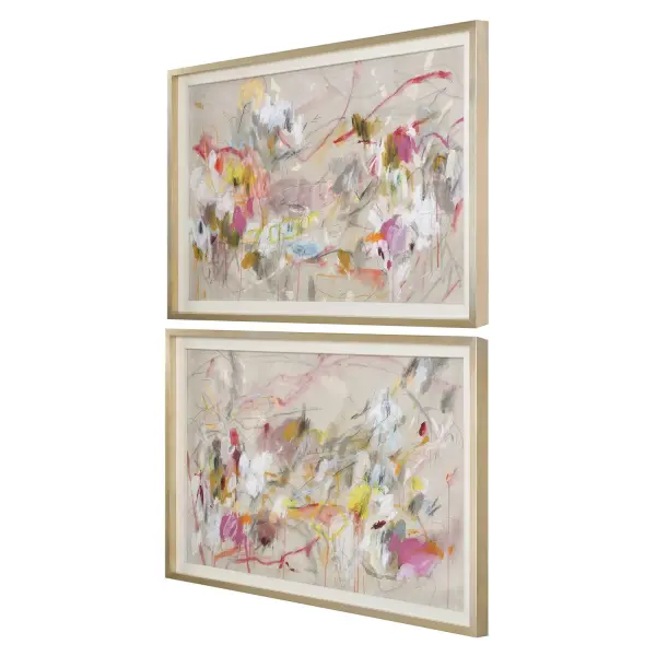 A vivid two-piece abstract print set framed in brushed champagne silver, capturing urban energy with a sophisticated linen-lined finish.