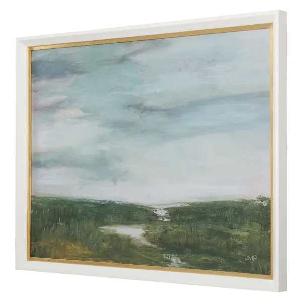 A calming coastal marsh scene by artist Julia Purinton, framed in white wood with gold leaf detailing. Adds understated Southern elegance to living spaces and hallways.
