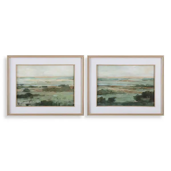 This framed valley landscape print pairs rich green and tan tones with a natural oak veneer frame, offering an easy way to add warmth to a wall.