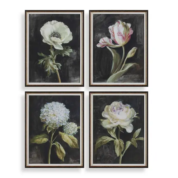 A traditional botanical art set with soft floral tones and dark brown frames accented in gold. Easy way to add curated wall decor to multiple rooms.
