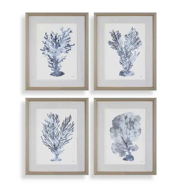Four blue-toned coral prints in light gray wood frames with linen mats and champagne liners bring understated coastal texture to any wall grouping.