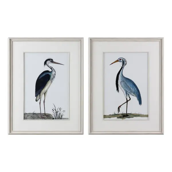 This bird-print wall art brings a breezy, coastal feel with distressed whitewashed wood frames and protective glass covering. A simple, decorative accent for casual interiors.