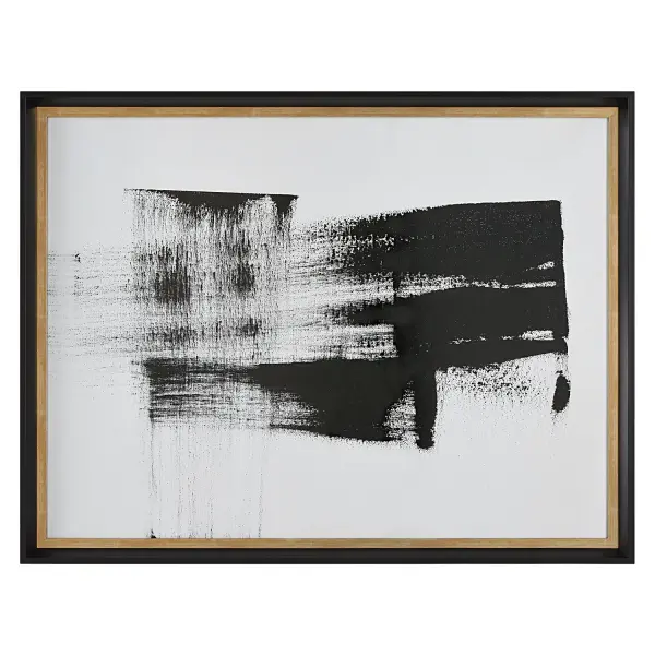 A striking framed print with a black-and-white composition under glass, finished with a black frame and aged gold inner lip. Versatile hanging orientation adds styling flexibility.