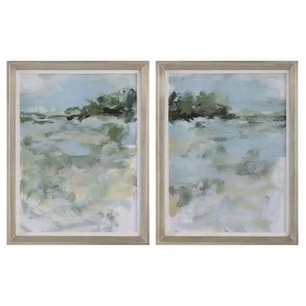 This petite two-piece set pairs cool-toned abstract art with a delicate white linen liner and champagne silver frame, offering an easy, polished accent for walls that need a soft focal point.