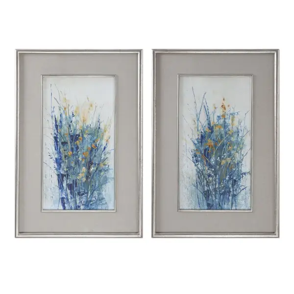 A refined wall art piece pairing bold indigo florals with soft gray linen matting and a distressed silver frame for understated elegance.