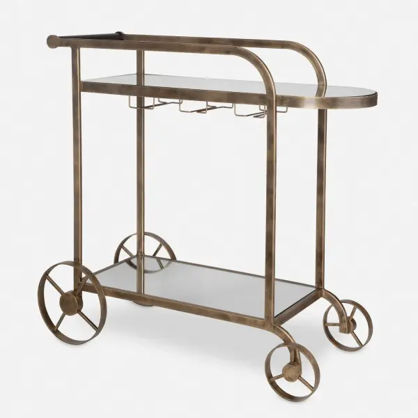 Staying True To Its Name Carrinho, Meaning Cart Or Trolley, Is The Perfect Balance Of Both Beauty And Functionality. Finished In Antique Brass With Two Mirror Shelves That Are Perfect For Any Coffee Beverage Or Cocktail. Collection: Carrinho Finish: Antique Brass Width: 38.25" Height: 36.25" Length: 16.25" Weight: 43.00 lb Material: Metal, Mirror Country of Origin: India Safety Rating: Indoor Only