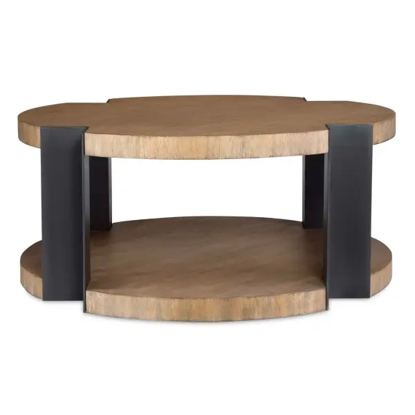 This Contemporary Coffee Table Harmonizes Natural Wood Elements With Industrial Style. Matte Black Metal Posts Accent The Circular Top And Lower Shelf, Both Crafted From Warm, Neutral Wood Tones, Creating A Bold Contrast That Will Be A Striking Piece In Any Space. Collection: Loana Designer: Matthew Williams Finish: Matte Black Width: 36.00" Height: 16.00" Length: 36.00" Weight: 80.70 lb Material: Mdf Sengon Veneer With Mahogani Wood And Metal Country of Origin: Indonesia Safety Rating: Indoor Only