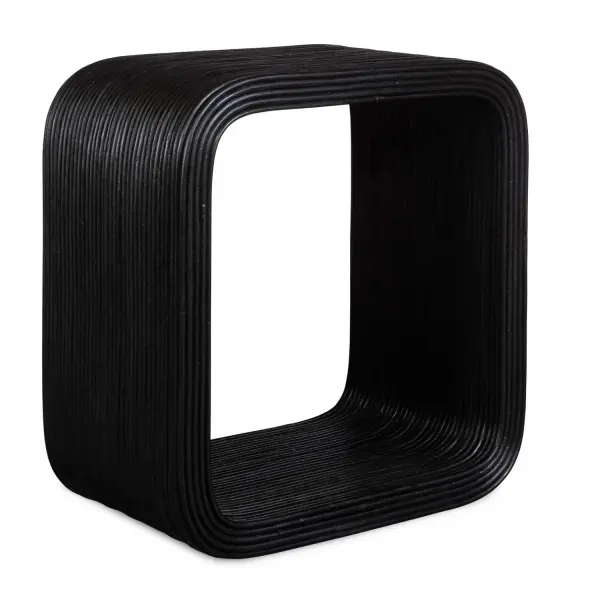 This Side Table Seamlessly Blends Modern Design With Natural Elements. This Cube-shaped Table Features Sleek Natural Rattan In A Black Finish That Adds A Contemporary Touch To Any Room. Collection: Compton Designer: David Frisch Finish: Black Width: 23.50" Height: 25.00" Length: 13.50" Weight: 22.30 lb Material: Rattan Core And Mahogani Wood Country of Origin: Indonesia Safety Rating: Indoor Only