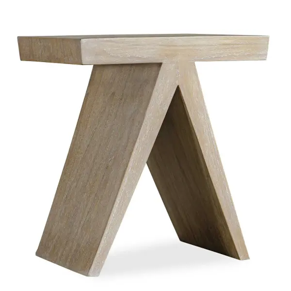 Crafted From Mindi Wood Veneer, This Accent Table Boasts A Minimalist, Geometric Design With An Architectural Flair. Its Unique Angled Base Provides A Modern Twist, Creating A Visually Striking Silhouette. The Natural Wood Grain Adds Warmth And Texture, Making This Table A Versatile Piece That Pairs Well With A Range Of Styles. Collection: Pruitt Designer: Matthew Williams Finish: Angled Base Width: 22.25" Height: 24.25" Length: 15.75" Weight: 26.46 lb Material: Mindi Wood, Mdf & Mindi Veneer Country of Origin: Indonesia Safety Rating: Indoor Only