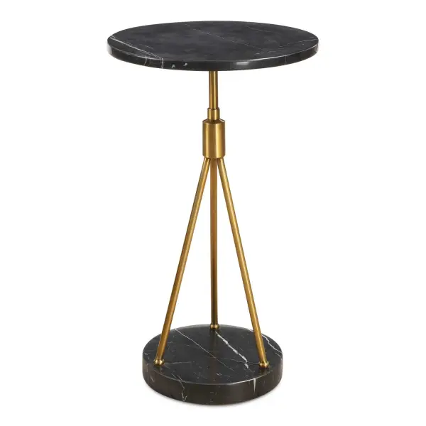 This Stylish Accent Table Seamlessly Fuses Luxurious Materials With A Sophisticated Design. This Table Is Crafted By Fusing A Black Marble Base And Top With Stunning White Veining With An Intricate Tripod Brass Finished Body. Due To The Nature Of Marble, Each Piece Will Have A Unique Coloration And Veining Pattern. Collection: Rosston Designer: John Kowalski Finish: Brass Width: 13.75" Height: 24.00" Length: 13.75" Weight: 22.00 lb Material: Iron, Marble Country of Origin: China Safety Rating: Indoor Only