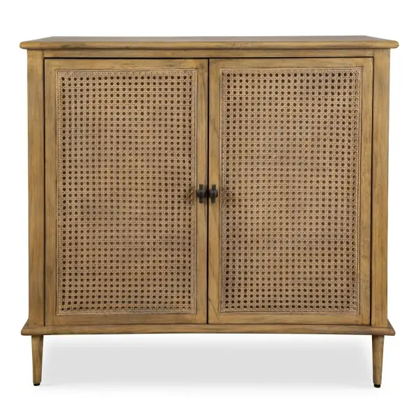 Mid Century Inspired With Accents Of Natural Rattan Cane, This Two Door Cabinet Features Mindi Solids And Veneers Finished In A Soft Oak Stain. The Two Doors Have Metal Hardware Finished In Dark Gunmetal. Collection: Coast Finish: Soft Oak Width: 36.00" Height: 34.00" Length: 16.00" Weight: 68.45 lb Material: Mdf Oak Veneer And Oak Wood Country of Origin: Indonesia Safety Rating: Indoor Only