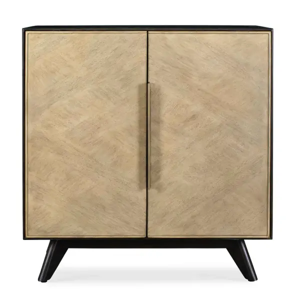 This 2 Door Cabinet Comprised Of Mango And Java Wood Veneers Presents A Striking Contrast With Its Sleek Dark Walnut Finished Case And Light Toned Alternating Grain Direction Doors. Creating A Dynamic Juxtaposition That Adds Depth And Visual Intrigue, Finished With Elegant Gold Finished Hardware. Has Soft Close Hinges. Collection: Reina Designer: Matthew Williams Finish: Dark Walnut Width: 32.00" Height: 34.25" Length: 15.25" Weight: 66.00 lb Material: Mdf Mango Veneer And Java Wood Country of Origin: Indonesia Safety Rating: Indoor Only