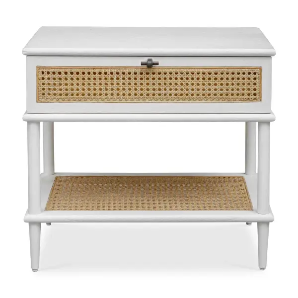 This Side Table, Crafted From Mindi Wood In A White Finish, Showcases Natural Rattan Cane Webbing On The Drawer Front And Lower Shelf. It Is Beautifully Accented With Bronze Hardware, Adding A Touch Of Contemporary Elegance To Its Design. Collection: Coast Finish: White Width: 25.75" Height: 23.00" Length: 18.75" Weight: 29.76 lb Material: Mindi Wood And Mdf Mindi Veneer With Rattan Cane Country of Origin: Indonesia Safety Rating: Indoor Only