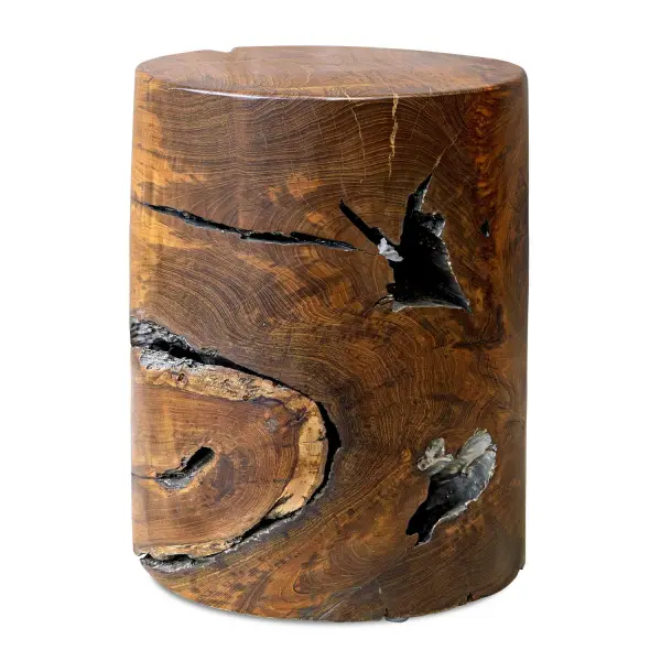 Crafted Entirely From Teakwood, This Accent Stool Showcases Dramatic Spalting, Beautifully Accentuated By The Natural Teak Finish And Is Complemented By Antique Silver-finished Imperfections Peaking Throughout The Piece, Adding Character To Its Design. Solid Wood Will Continue To Move With Temperature And Humidity Changes, Which Can Result In Cracks And Uneven Surfaces, Adding To Its Authenticity And Character. Collection: Rafe Finish: Natural Teak Width: 13.50" Height: 18.00" Length: 13.50" Weight: 55.66 lb Material: Teak Wood Country of Origin: Indonesia Safety Rating: Indoor Only