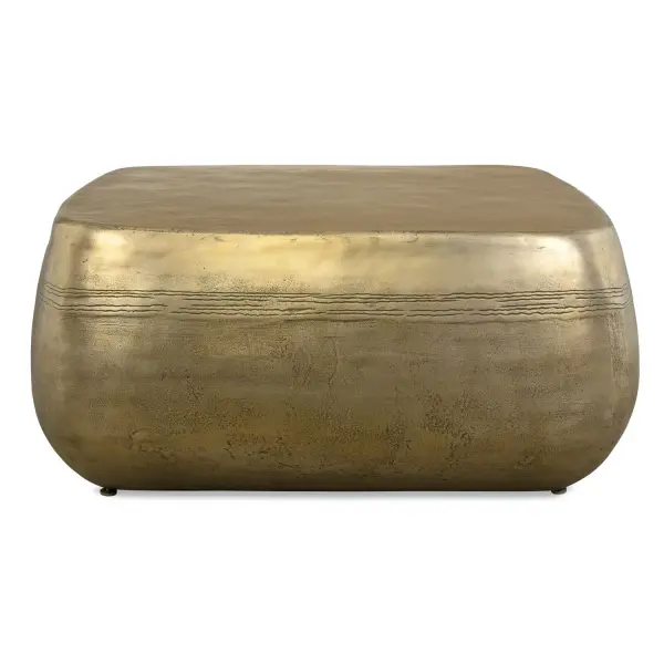 A textured, banded aged brass finish over cast aluminum gives this coffee table a sculptural, organic presence suited to both interior rooms and covered outdoor spaces.