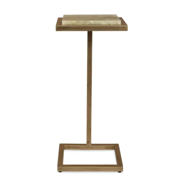 A petite drink table pairing genuine marble with a sculptural iron base. Unique veining makes each piece one-of-a-kind, adding refined texture to any seating area.