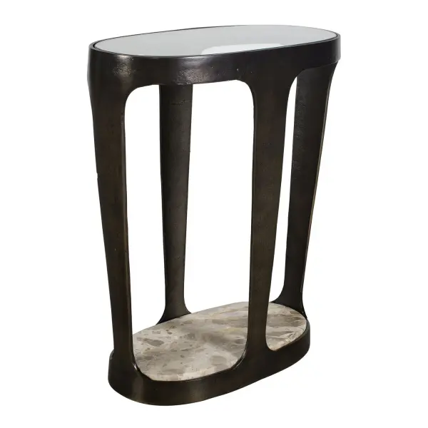 Coronado Features A Dark Bronze Cast Aluminum Base And Is Beautifully Topped With A Inset Glass Top And Grounded By A Lower Marble Shelf Featuring Subtle Neutral Veining. Due To The Nature Of Marble, Each Piece Will Have A Unique Coloration And Veining Pattern. Collection: Coronado Designer: John Kowalski Finish: Dark Bronze Width: 20.00" Height: 24.00" Length: 10.00" Weight: 20.00 lb Material: ALUMINIUM, MARBLE, GLASS Country of Origin: India Safety Rating: Indoor Only
