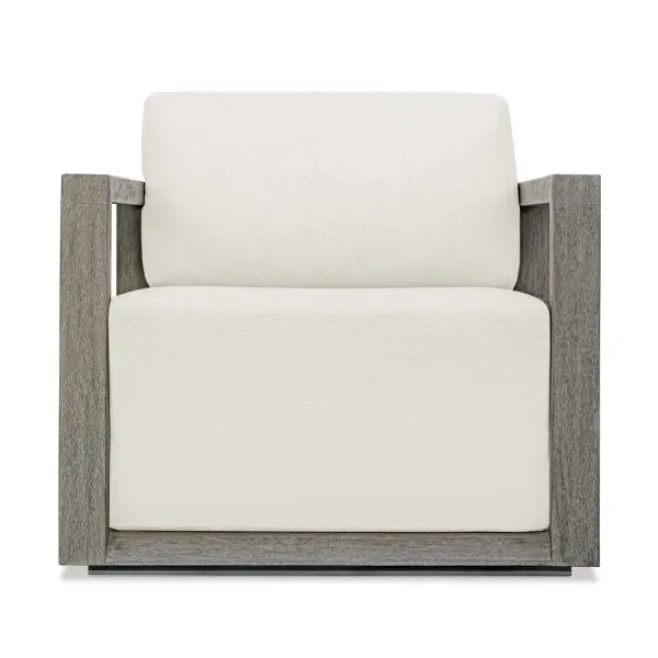 The Remsen Outdoor Lounge Chair Features A Striking Architectural Frame With Smooth Interior Curves That Give A Sculptural Presence. Constructed Of Solid Mahogany Wood In A Weathered Gray Finish With Wire-brushed Details. Its Generously Cushioned Floating Seat, Upholstered In An Oyster White Solution Dyed Acrylic Fabric, Is Designed To Withstand The Moisture And Dirt That Comes With Outdoor Use. Solid Wood Will Continue To Move With Temperature And Humidity Changes, Which Can Result In Cracks And Uneven Surfaces, Adding To Its Authenticity And Character. Collection: Remsen Designer: Matthew Williams Finish: Weathered Gray Width: 33.50" Height: 32.00" Length: 35.25" Weight: 51.20 lb Material: Mahogani Wood And Fabric Crescent Cloud Dancer Country of Origin: Indonesia Safety Rating: Indoor/Outdoor