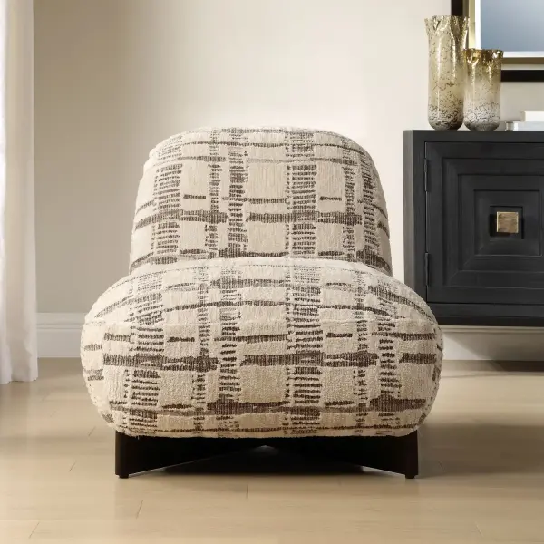This Modern, Armless Accent Chair Features A Plush, Curved Silhouette Beautifully Upholstered In A Textured Broken Plaid Showcasing A Woven Ground In Mocha And Caramel, Highlighted By Soft Toast Chenille Accents. Cradled By A Solid Wood Base In Dark Walnut. Collection: Evans Designer: Renee Wightman Finish: Dark Walnut Width: 28.70" Height: 30.30" Length: 36.60" Weight: 61.60 lb Material: Foam, Fabric, Rubber Wood Country of Origin: China Safety Rating: Indoor Only
