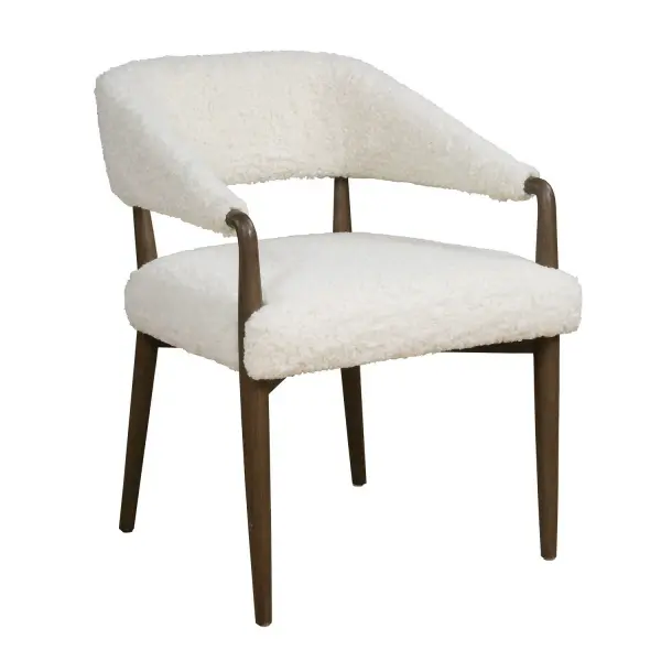 Perfect As A Dining Chair Or Small Accent Chair, The Austell Is Artfully Crafted From Solid Wood With A Dark Walnut Finish. Features An Open Barrel Back And Seat Upholstered In A Soft, Cream-toned Faux Shearling. Collection: Austell Designer: Matthew Williams Finish: Dark Walnut Width: 22.00" Height: 30.25" Length: 24.50" Weight: 29.83 lb Material: RUBBER WOOD,PLYWOOD,FOAM,FABRIC,HARDWARE Country of Origin: China Safety Rating: Indoor Only