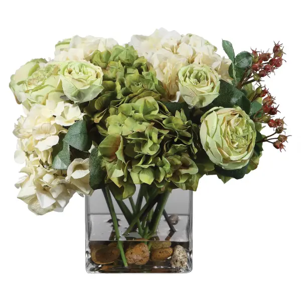 Cream and sage hydrangea blooms with rose cuttings in a glass vase with faux water offer a low-maintenance decorative accent for tabletops and shelves.