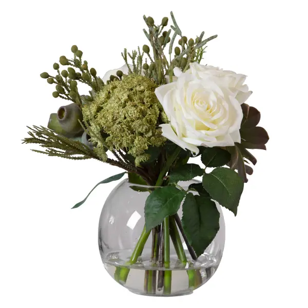 This clear glass bud vase pairs cream roses, succulents, and seed pods for a modern-organic look that requires zero maintenance, perfect for tabletop styling.
