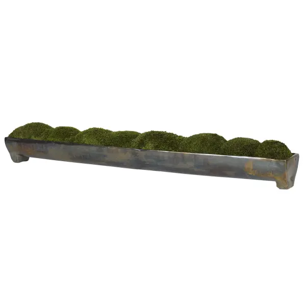 A tabletop nature accent pairing preserved moss with an aluminum tray in an oxidized bronze finish—organic texture meets sculptural metal.