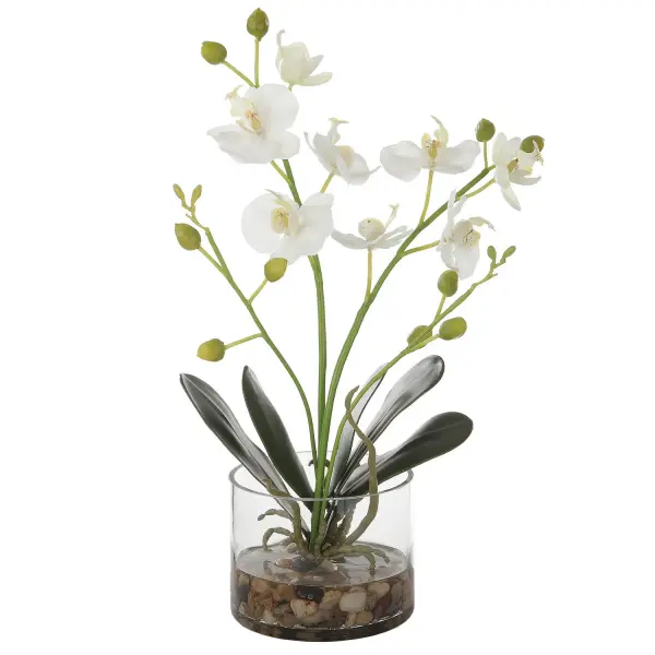This faux white orchid in a clear glass vase with faux water and river stones offers a realistic, low-maintenance decorative accent for tabletops and shelves.