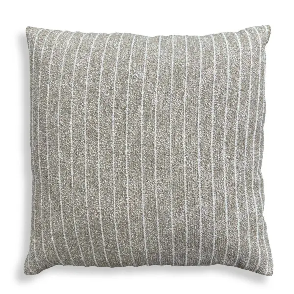 A putty boucle and cream Sunbrella-striped accent pillow, plush-filled and water-resistant—equally at home on a sofa or covered patio.